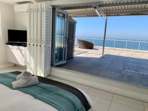 Escape to a Luxurious, Oceanfront Penthouse